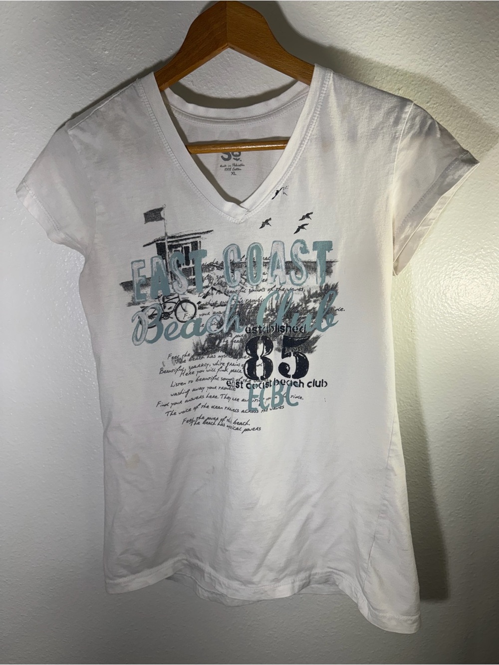 SO Y2K White V-Neck Tee with Teal and Black East Coast Graphic